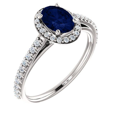 White gold Blue Sapphire Oval cut with diamond halo ring